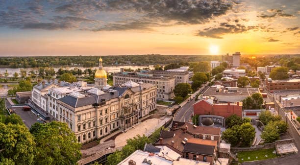 Aerial view of the New Jersey State House and downtown Trenton at sunset